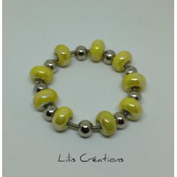 Bracelet en perles jaunes...