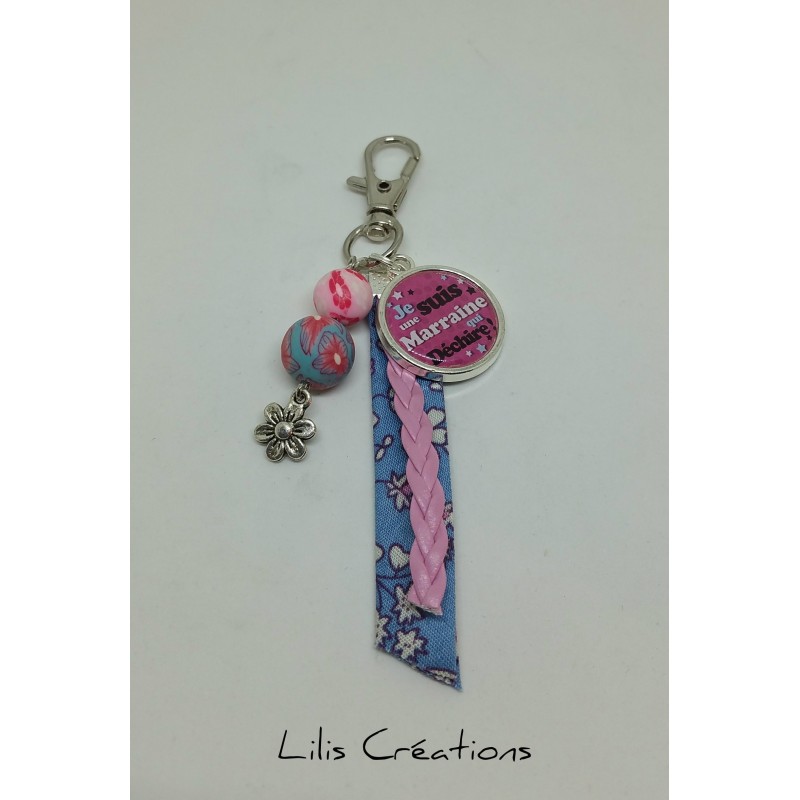 Porte-clés "Je suis une marraine qui déchire" rose et bleu