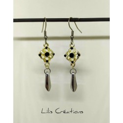 Boucles d'oreilles noir et...