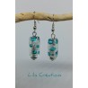 Boucles d'oreilles avec perles tubes en verre artisanale / bleu turquoise et argenté